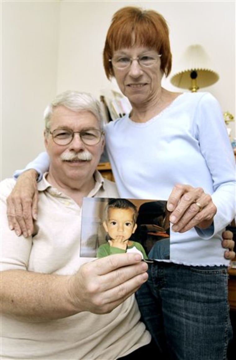 Donald and Frieda Fons hold a picture of their grandson Nathaniel Fons in their home Wednesday, April 21, 2010, in Land O' Lakes, Fla. Nathaniel, who was reported missing on Monday, turned up unharmed at New York City's St. Patrick's Cathedral. (AP Photo/Chris O'Meara)